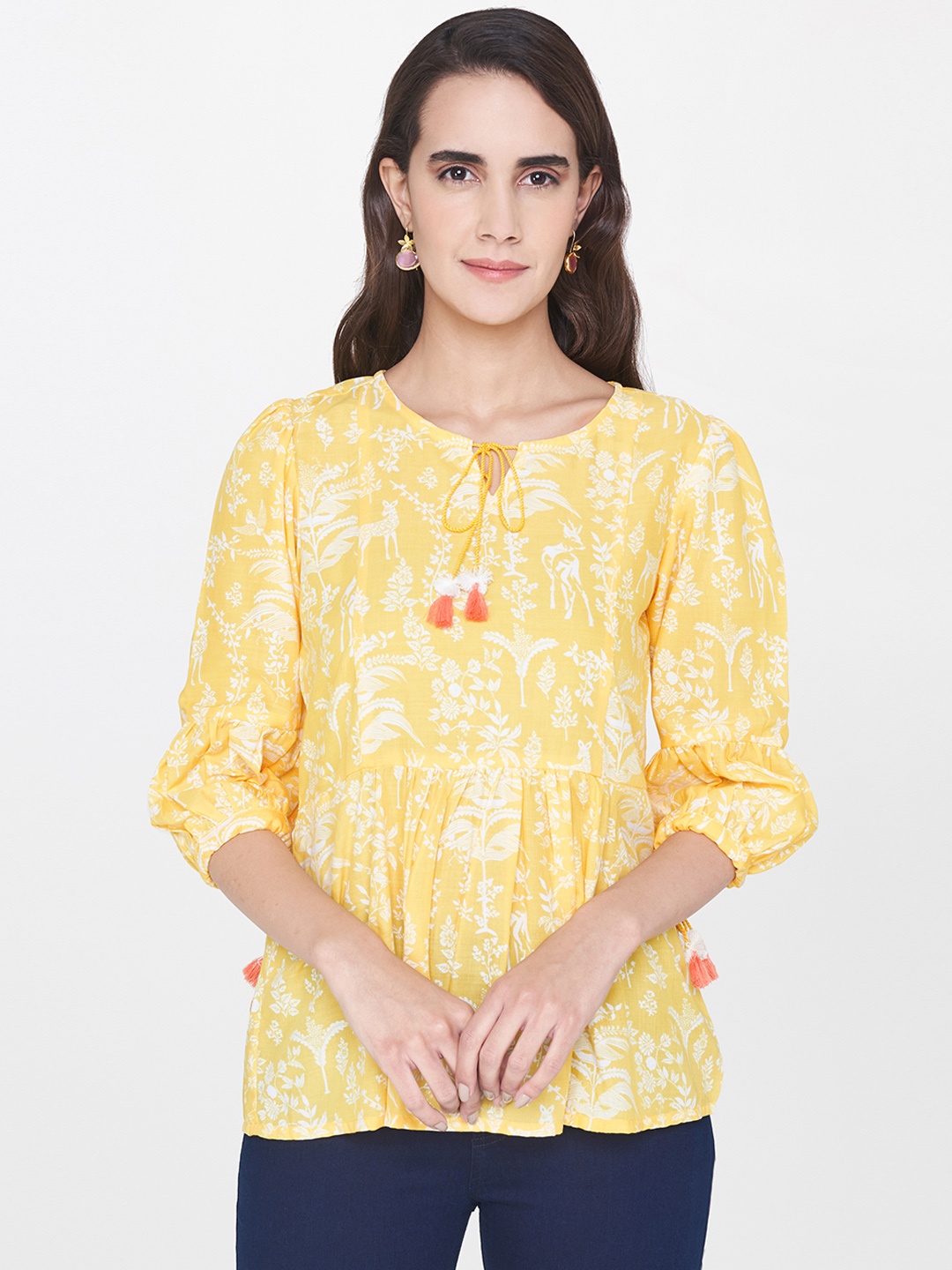 

Global Desi Women Yellow Printed Peplum Top
