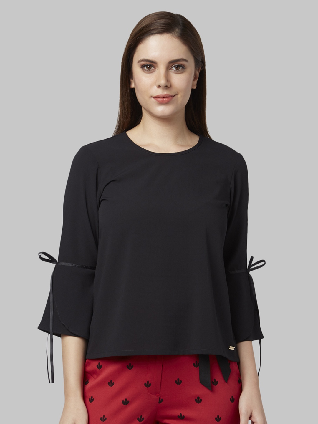 

Park Avenue Women Black Solid Top
