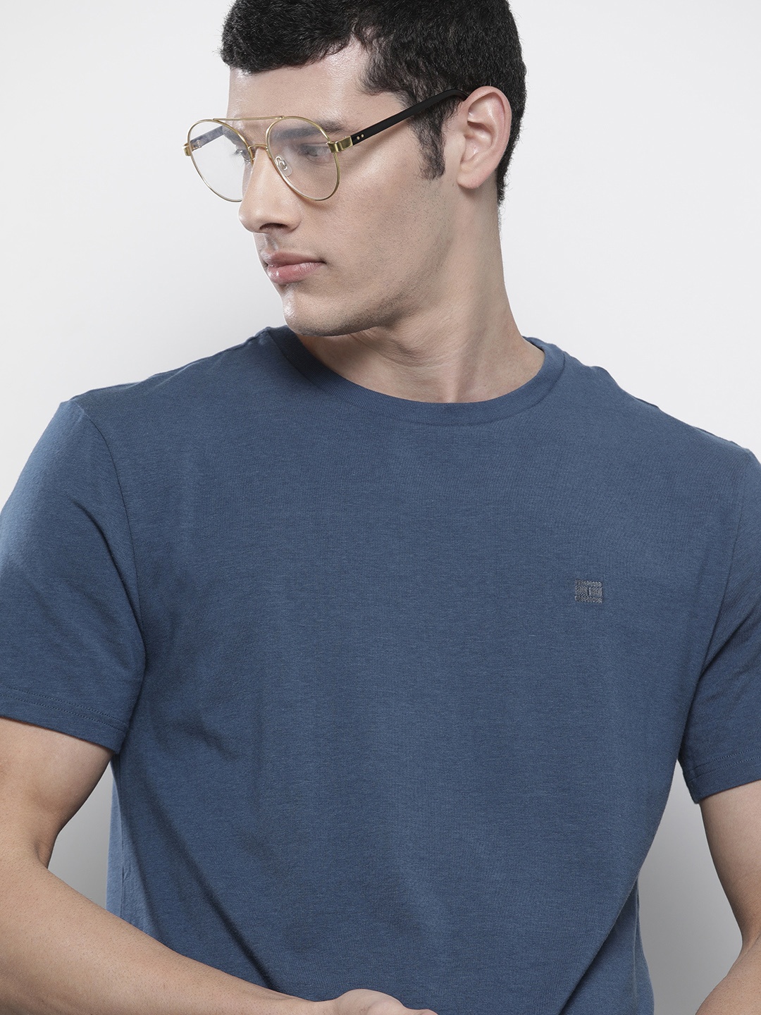 

Tommy Hilfiger Men Blue Solid Round Neck TShirt, Navy blue