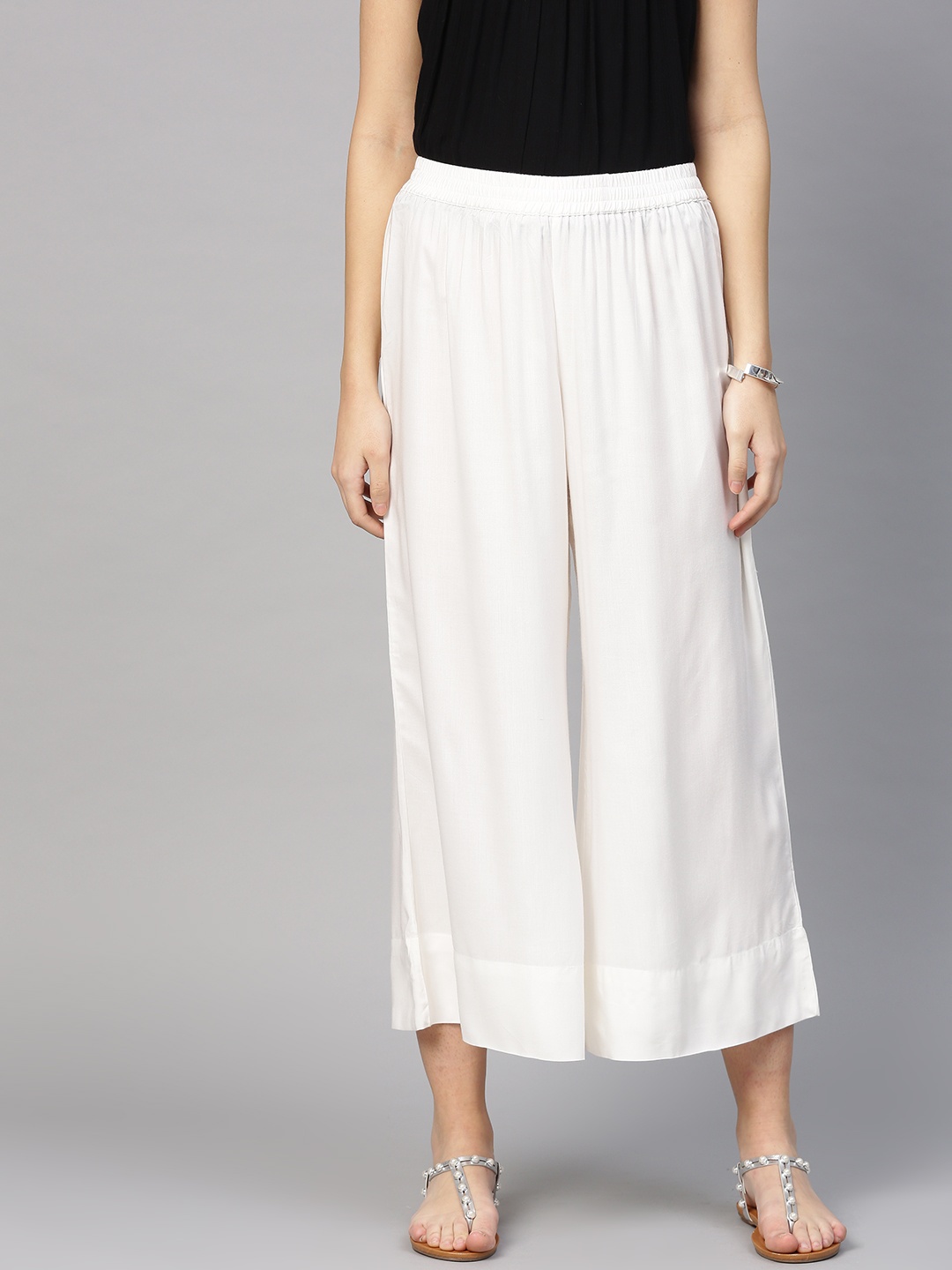 

Varanga Women White Solid Wide-Leg Palazzo