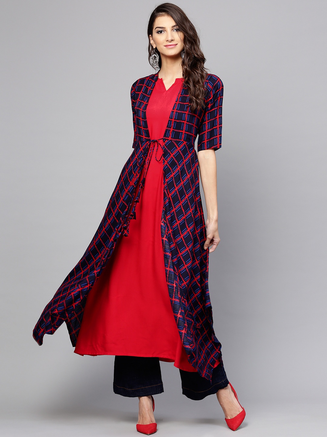 

Libas Women Red Solid Asymmetric Hemline A-Line Kurta