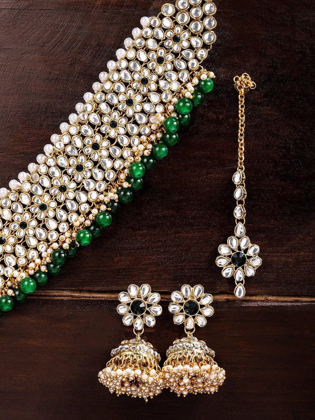 

Zaveri Pearls Gold Toned Kundan & Green Beaded Jewellery Set