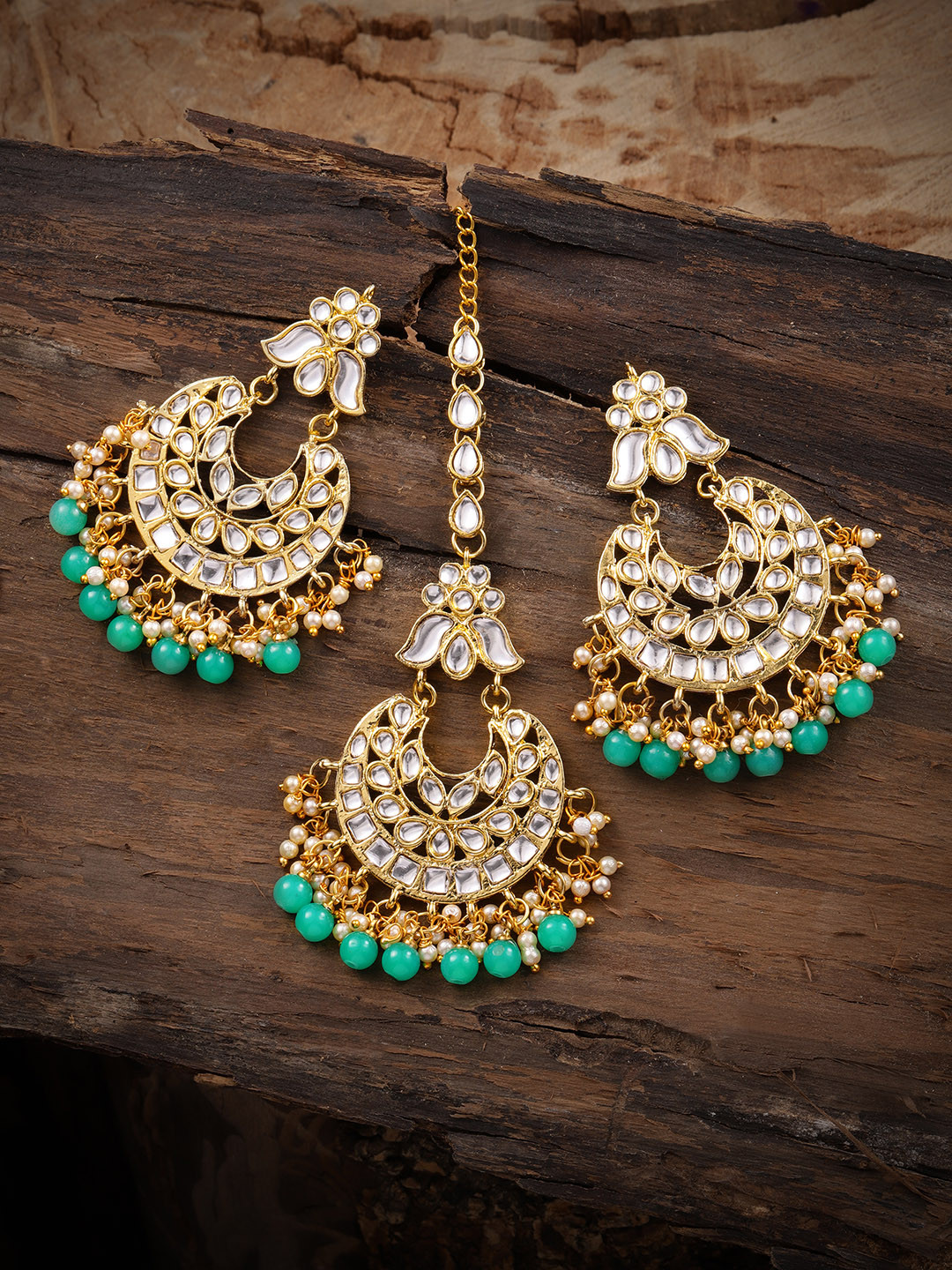 

Zaveri Pearls Gold Toned & Green Set of Earrings & Maang Tika