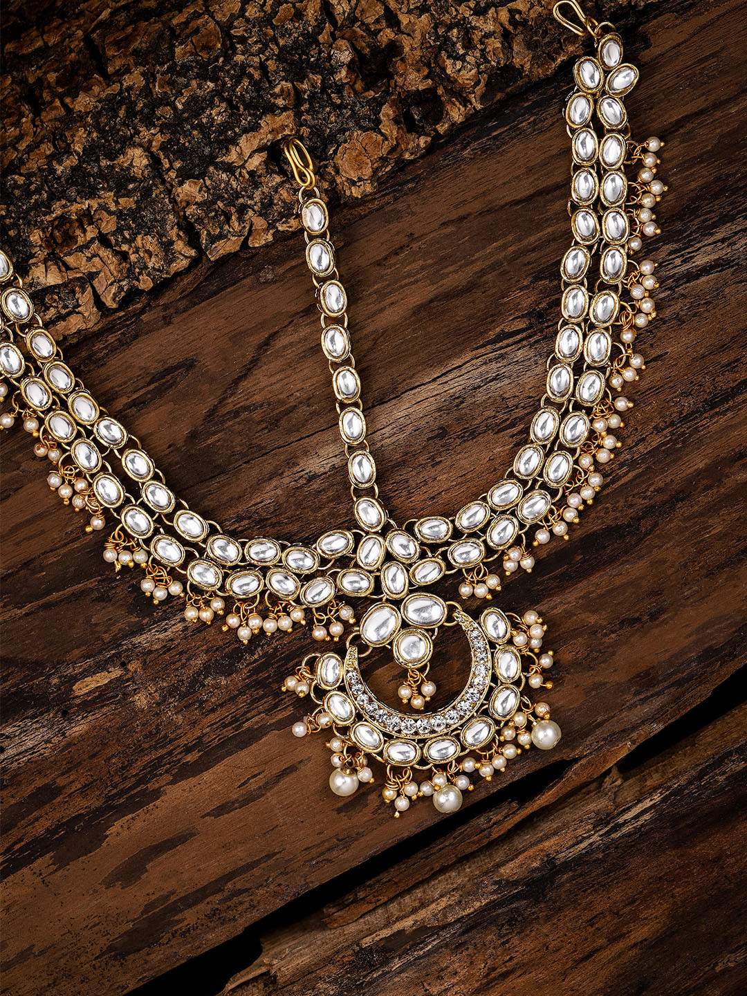 

Zaveri Pearls Gold-Toned Stone-Studded Matha Patti