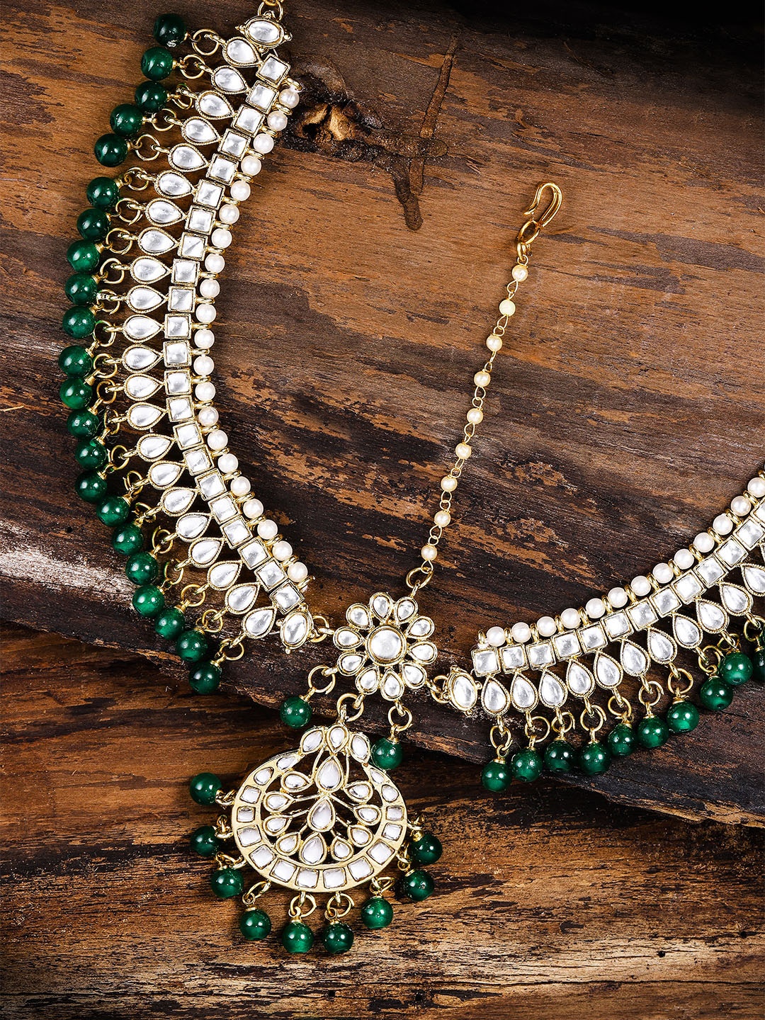 

Zaveri Pearls Gold-Toned Stone-Studded Matha Patti