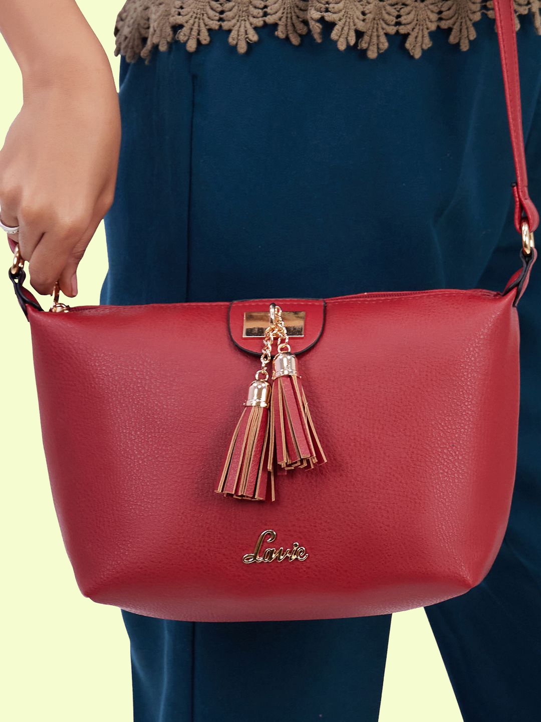 

Lavie Marma Red Solid Tasselled Sling bag