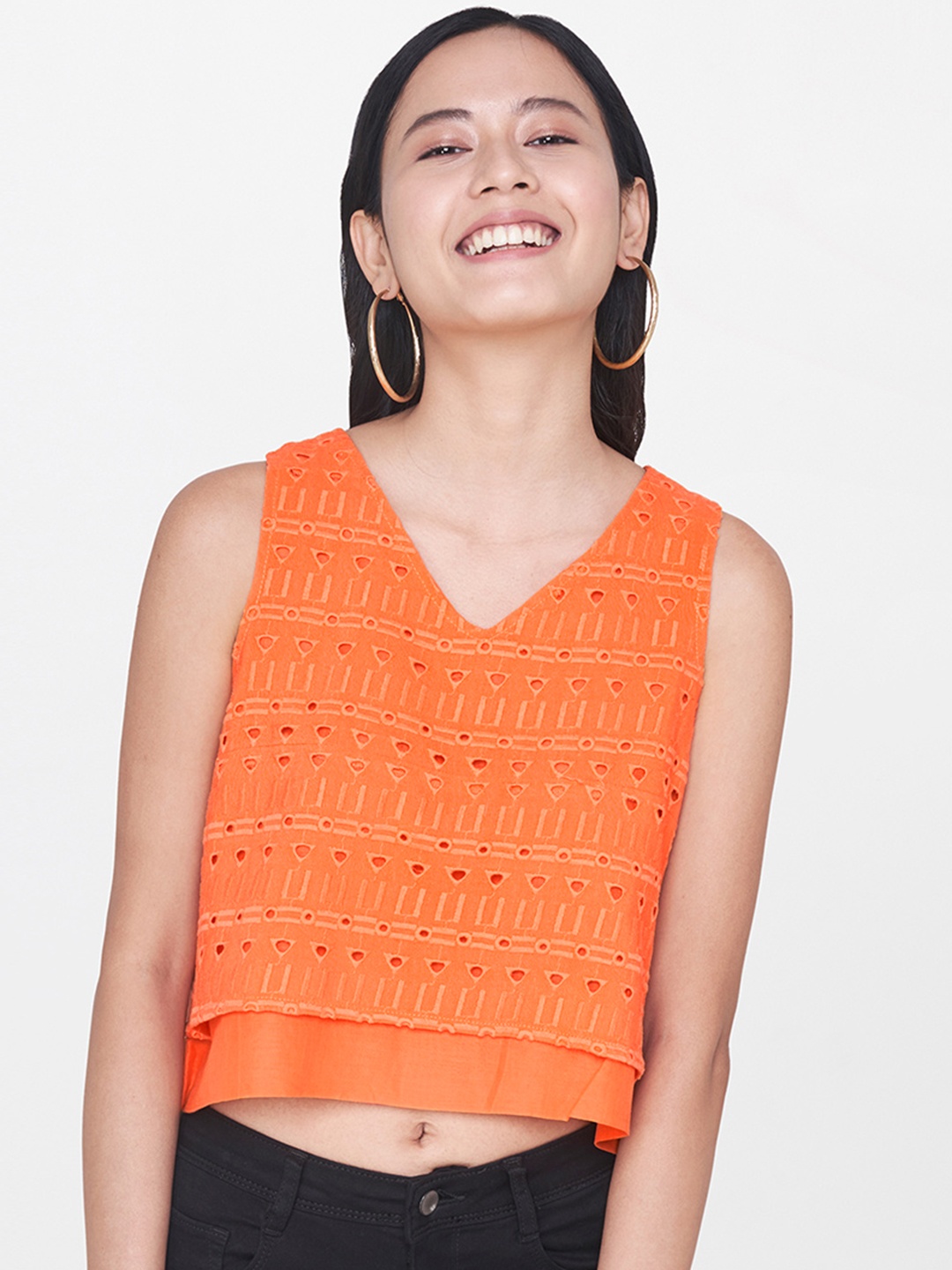 

Global Desi Women Orange Self Design Crop Top