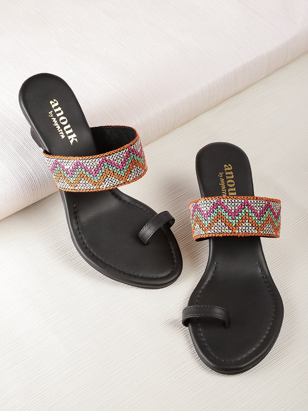 

Anouk Women Black & Beige Woven Design Wedges