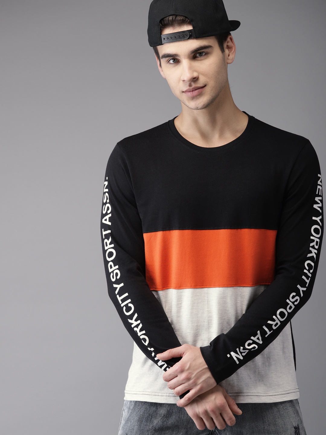 

Moda Rapido Men Black & Orange Colourblocked T-shirt