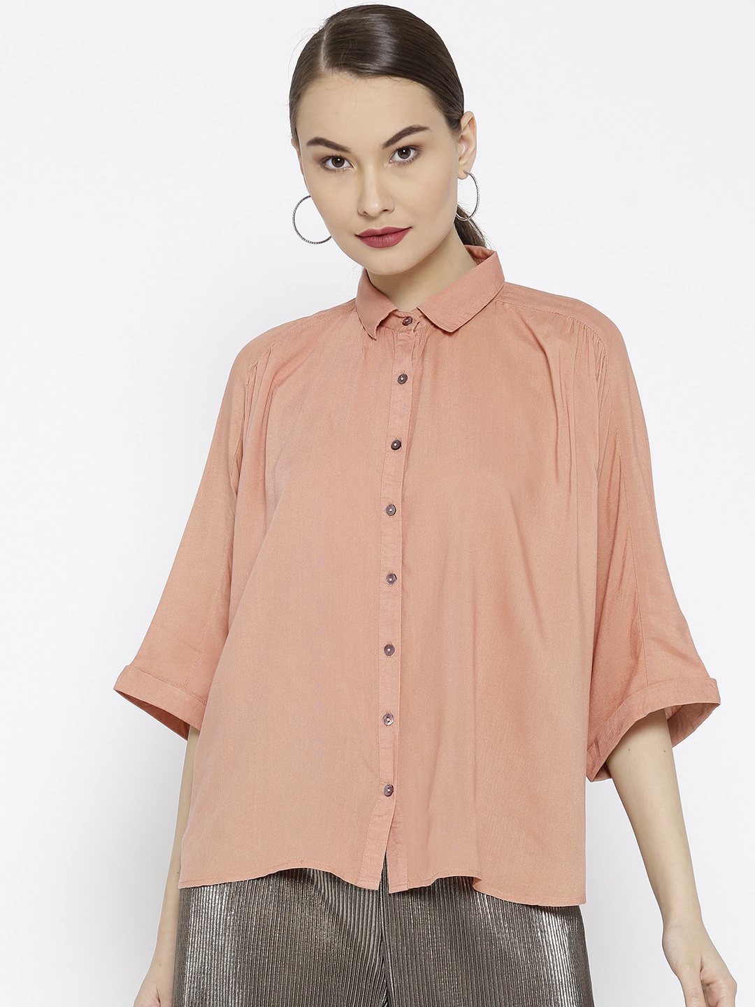 

Vaak Women Peach-Coloured Regular Fit Solid Casual Shirt