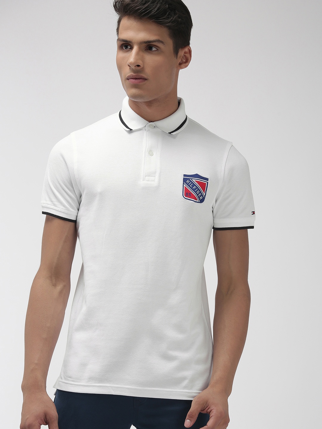 

Tommy Hilfiger Men White Solid Polo Collar Pure Cotton T-shirt