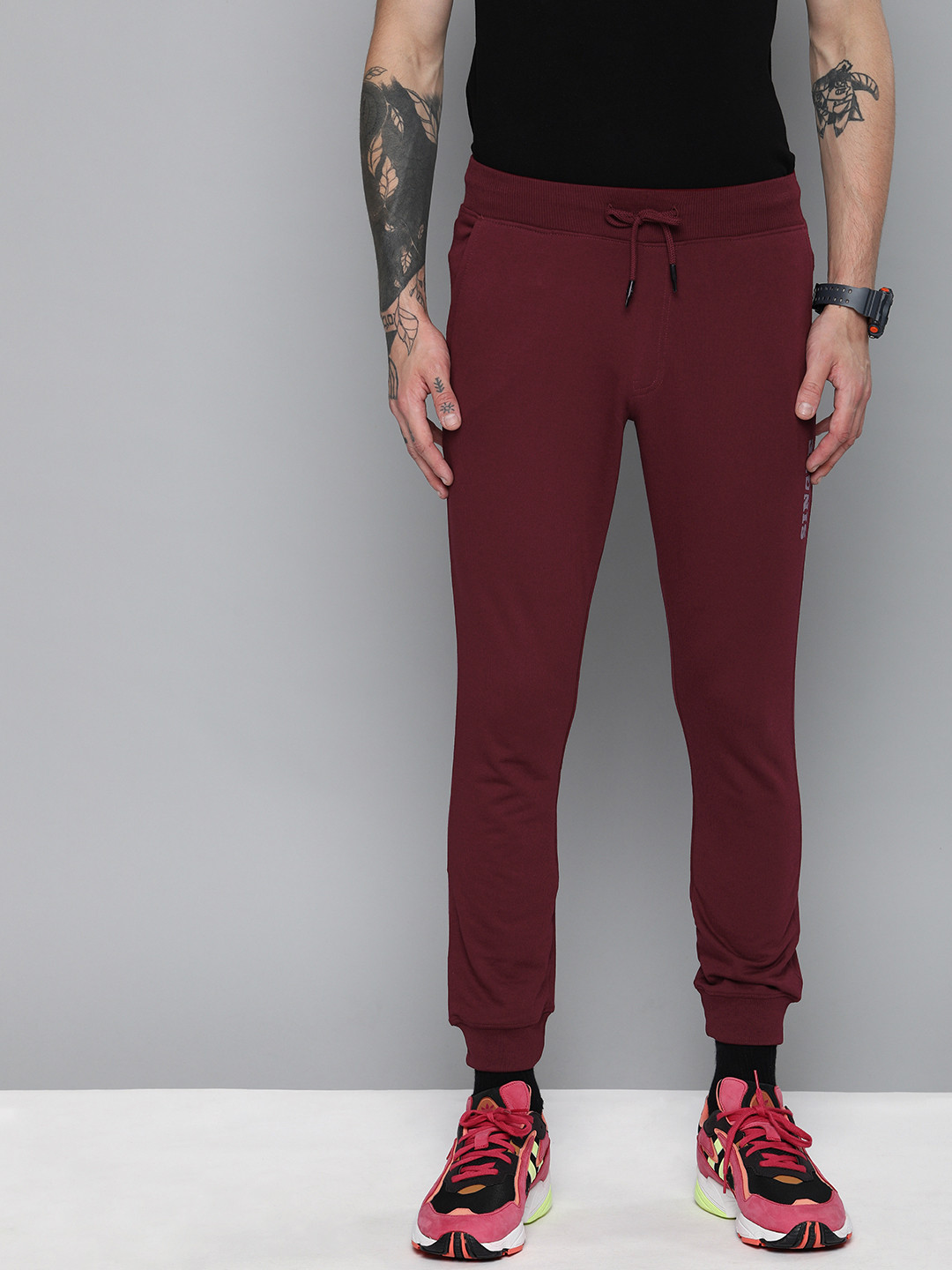 

SINGLE Men Maroon Solid Slim Fit Joggers