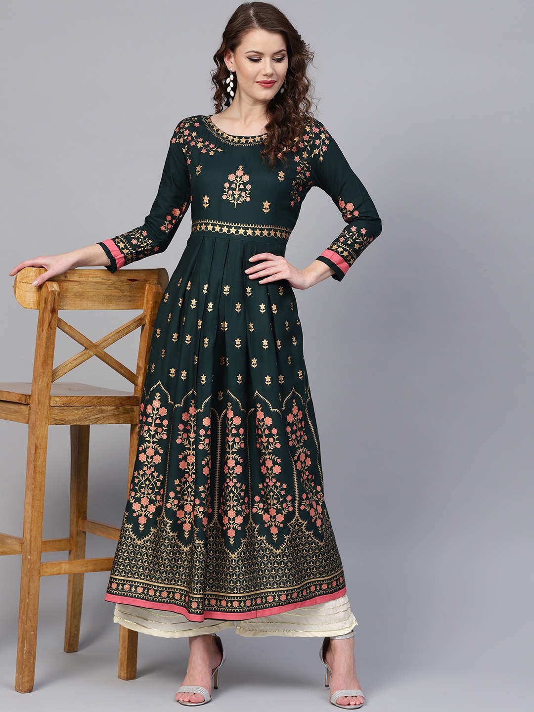 

Ishin Women Green & Golden Printed A-Line Kurta