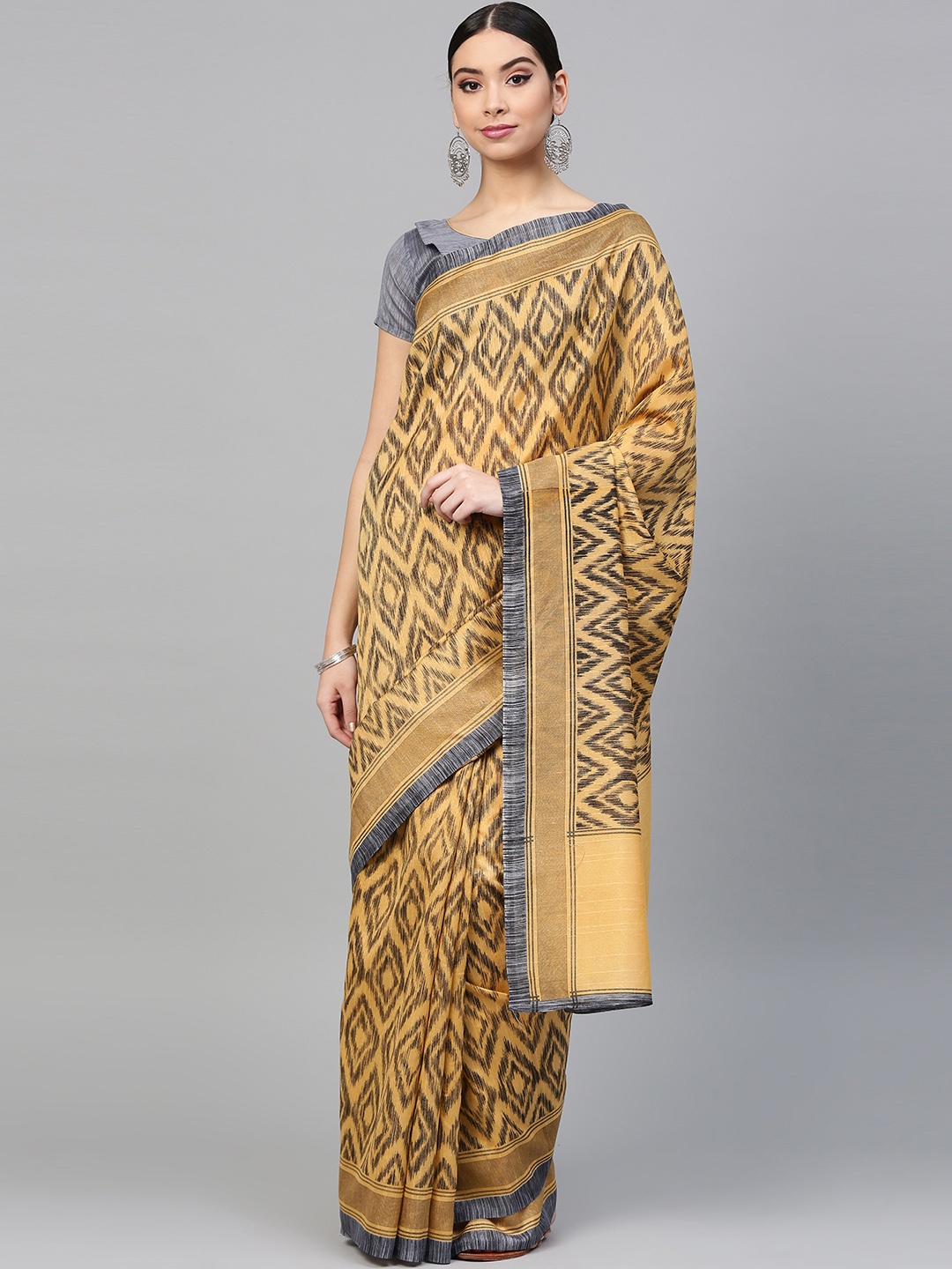 

Saree mall Beige & Black Printed Saree
