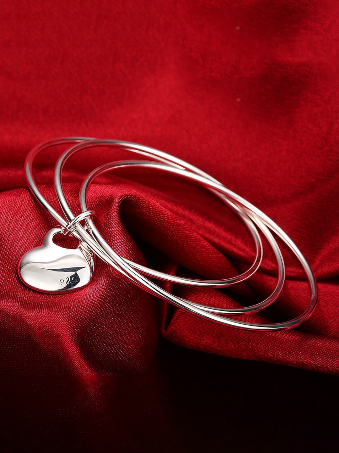 

Peora Women Silver-Toned Alloy Charm Bracelet