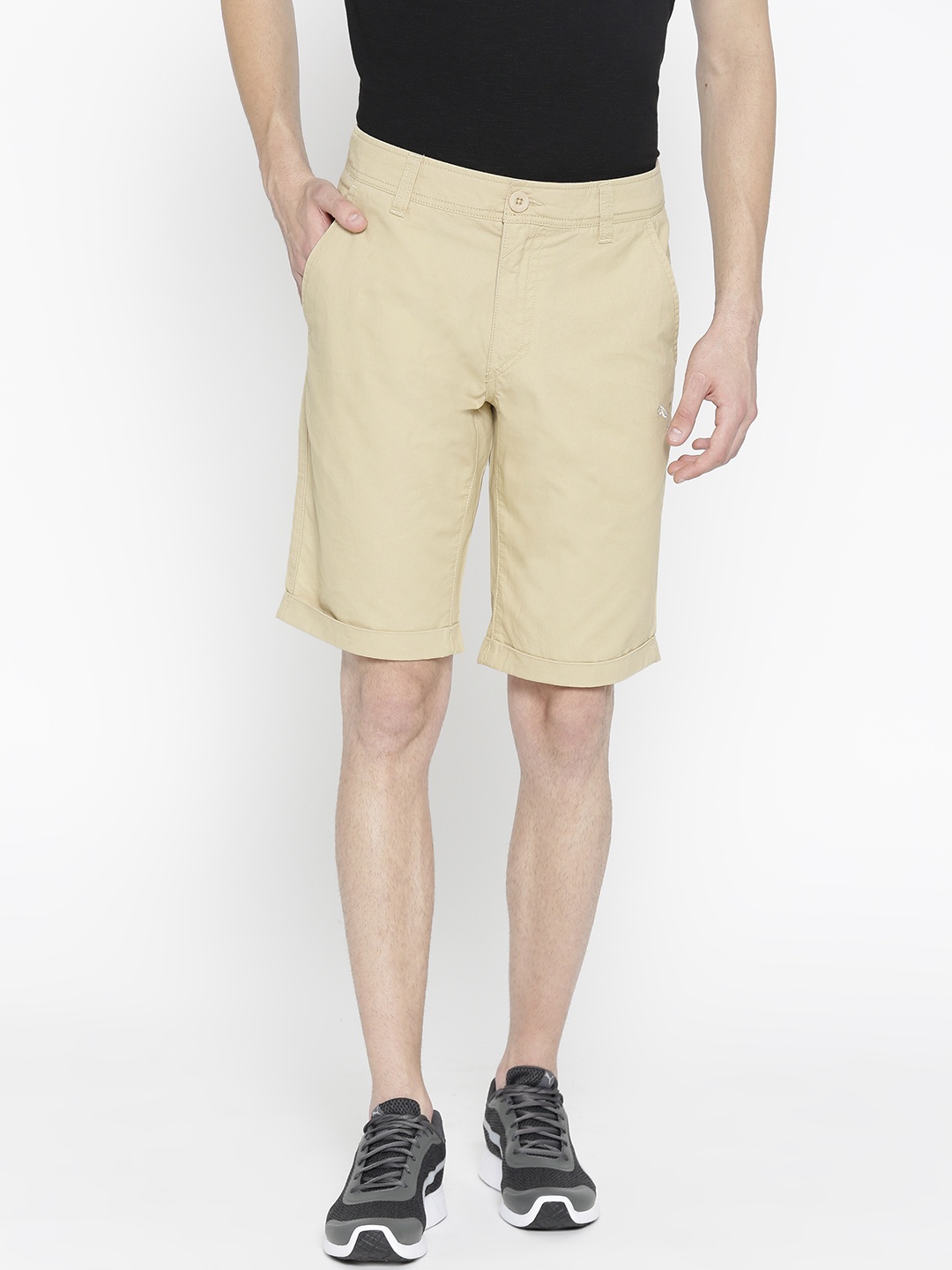 

Puma Men Beige Solid Woven Chino Shorts