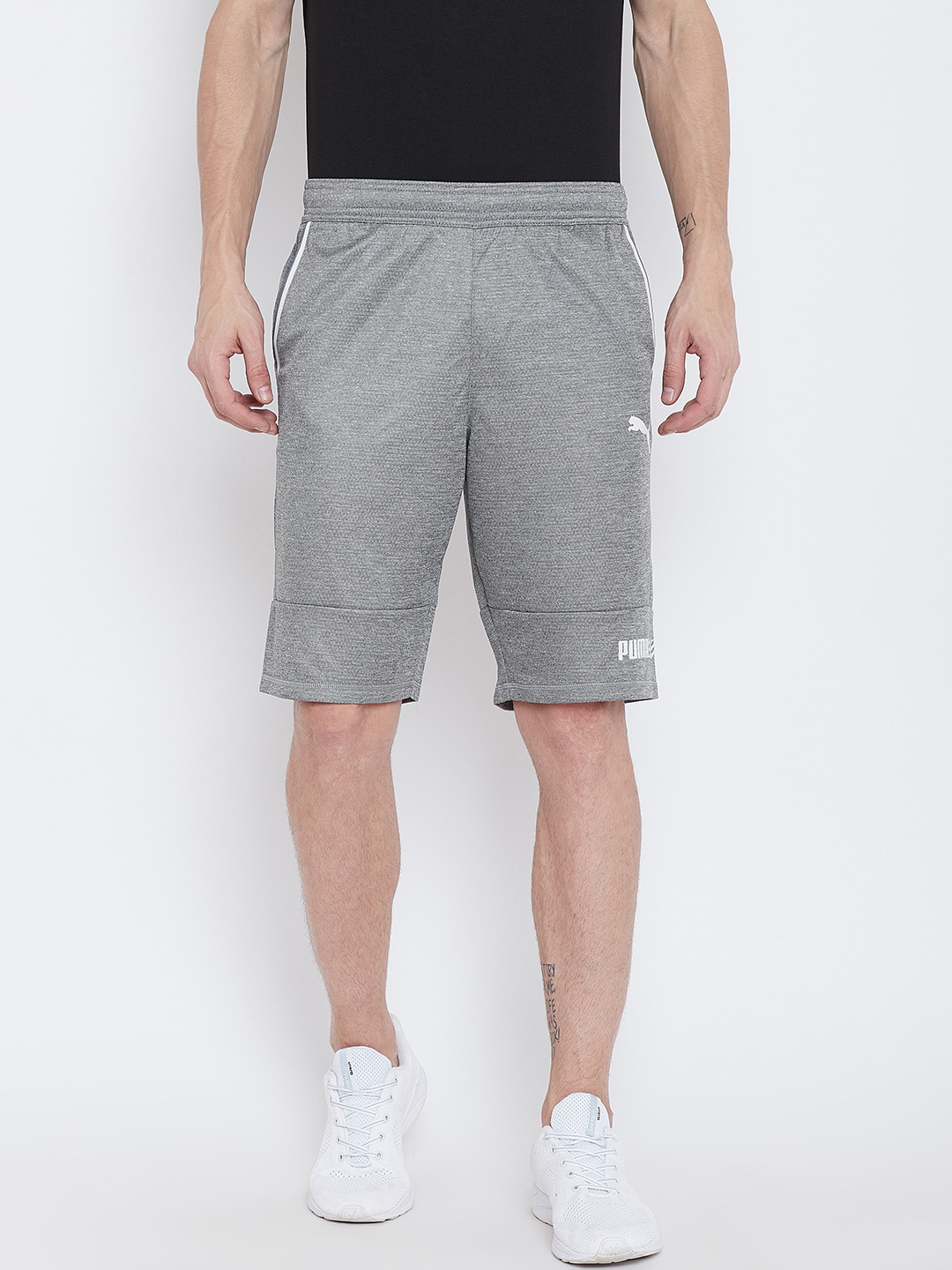 

Puma Men Grey Solid Regular Fit Tec Sports Shorts
