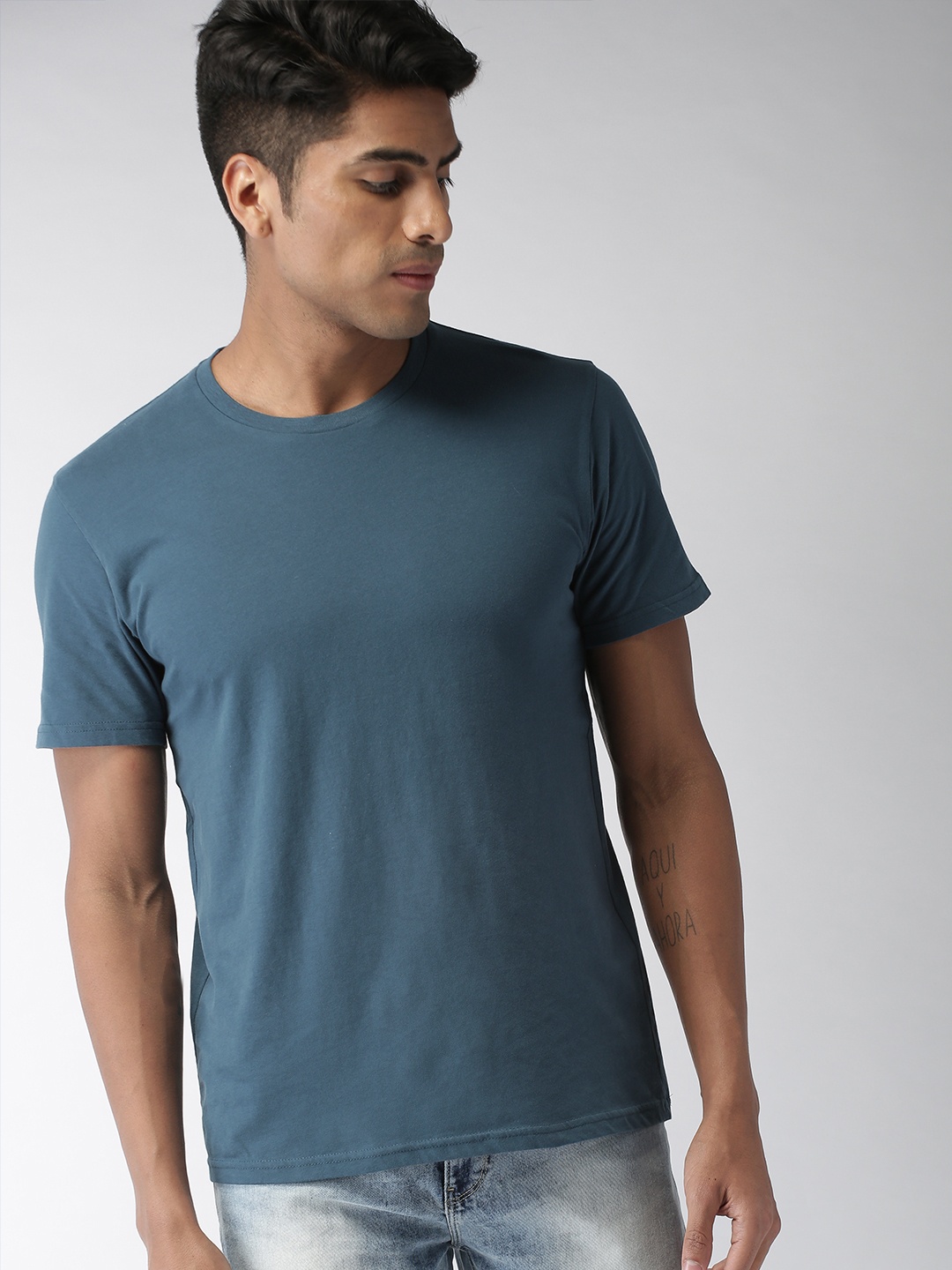 

Celio Men Teal Blue Solid Round Neck Pure Cotton T-shirt