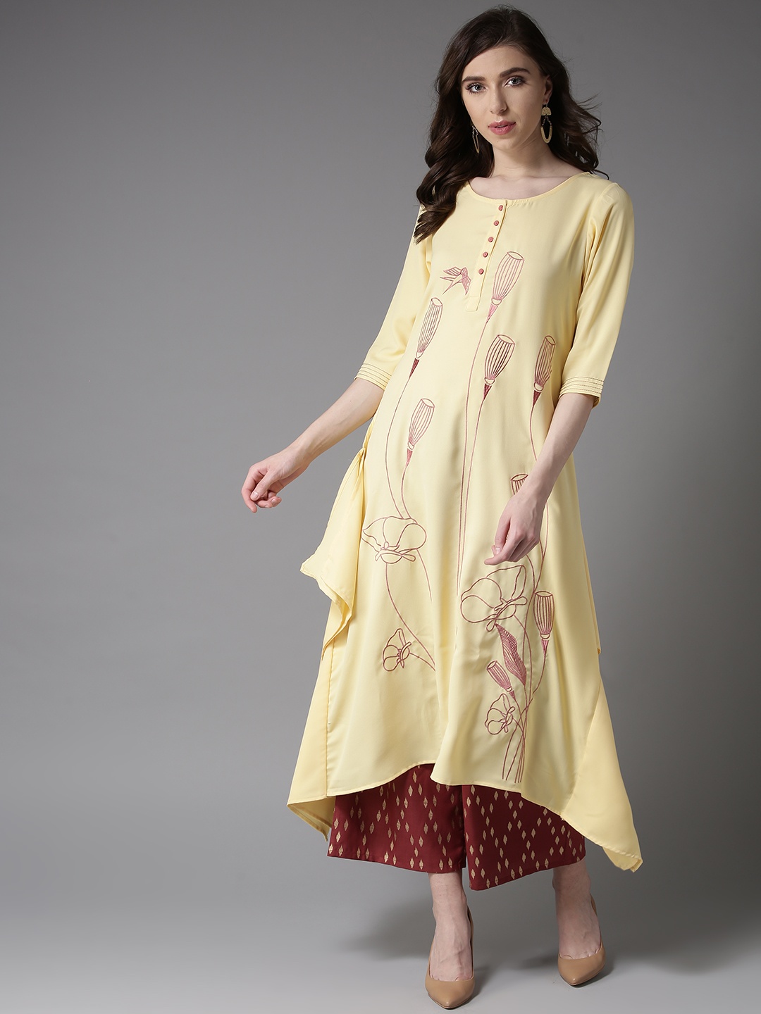 

Moda Rapido Women Yellow Embroidered Asymmetric A-Line Kurta