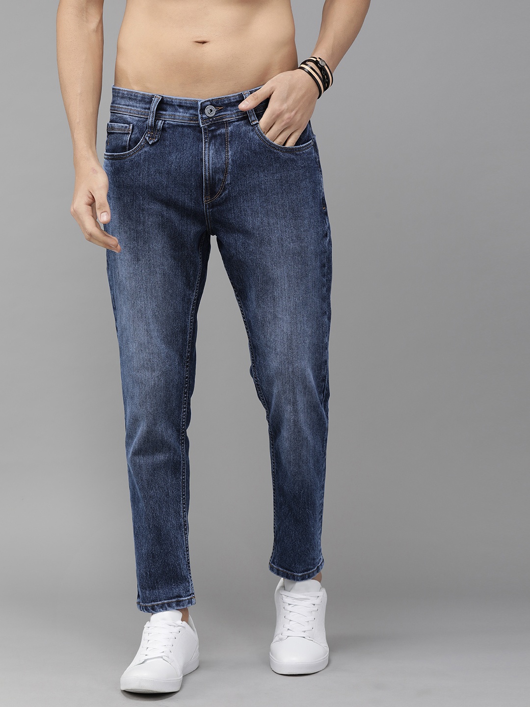 

Roadster Men Blue Carrot Regular Fit Mid-Rise Clean Look Stretchable Jeans