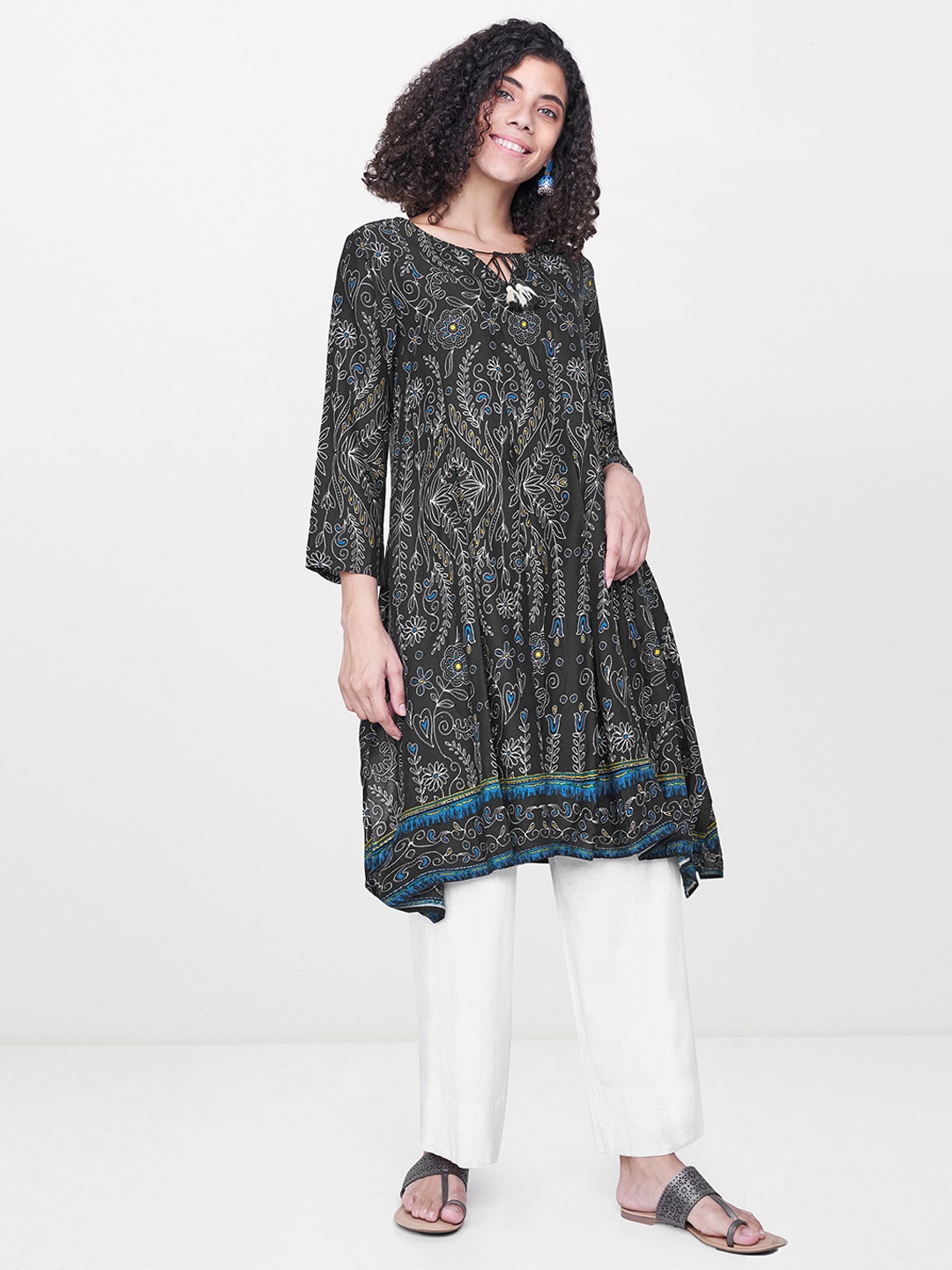 

Global Desi Women Black Printed Asymmetric A-Line Kurta