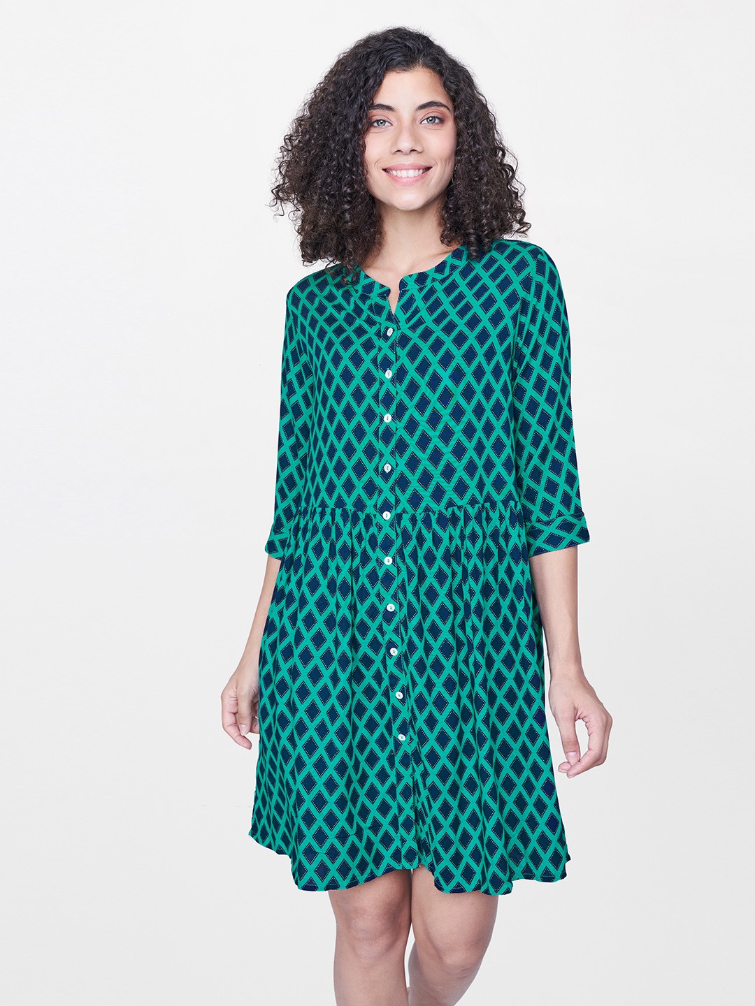 

Global Desi Women Green & Navy Blue Printed Shirt Dress