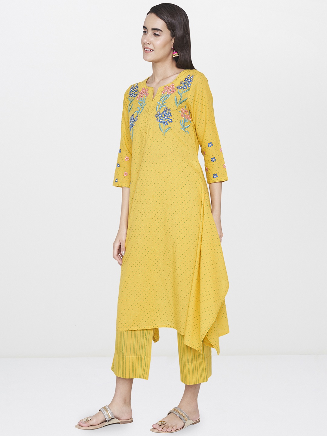 

Global Desi Women Yellow Printed Kurta with Trousers