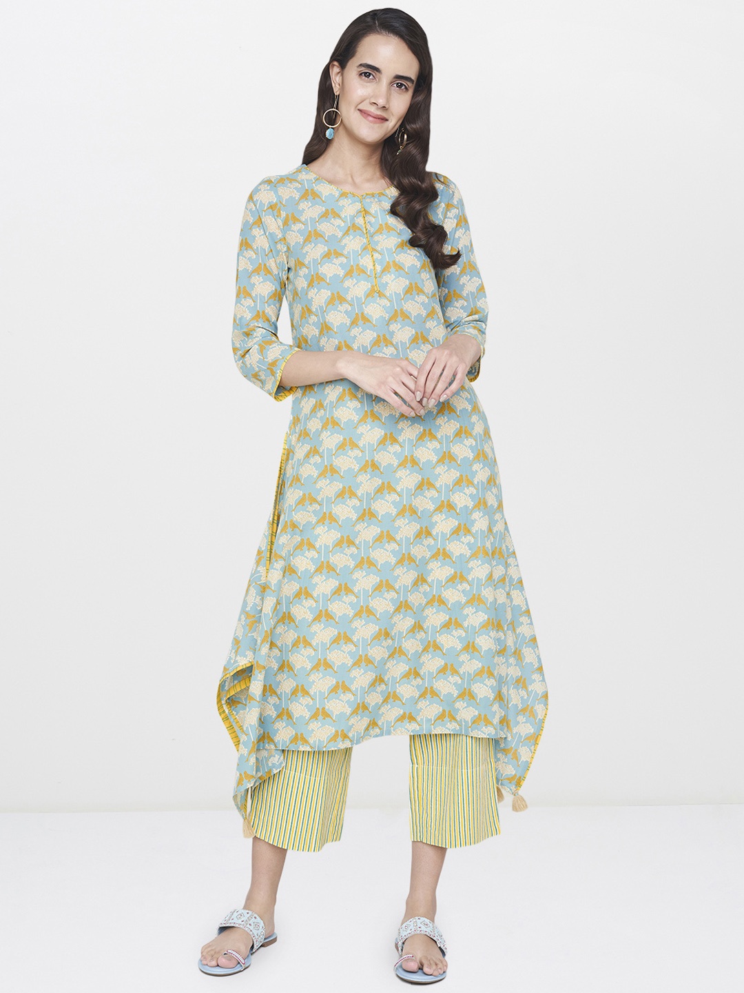 

Global Desi Women Blue Printed Kurta with Trousers