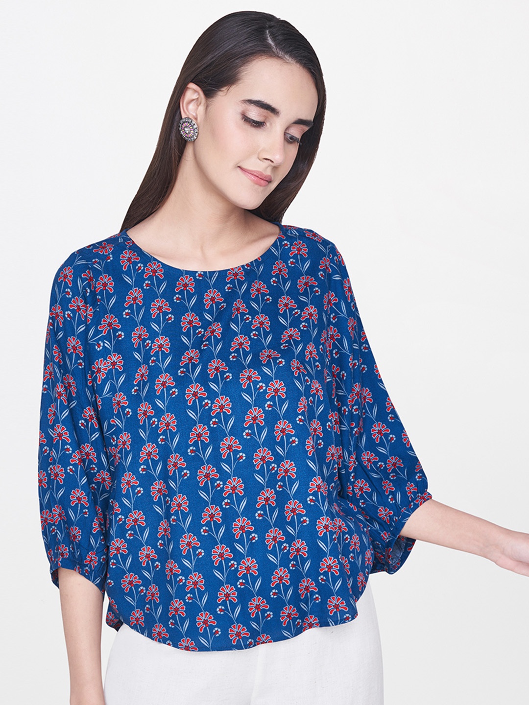 

Global Desi Women Blue Printed Kaftan Top