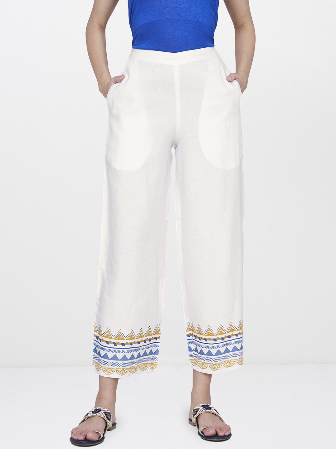 

Global Desi Women White Regular Fit Solid Regular Trousers