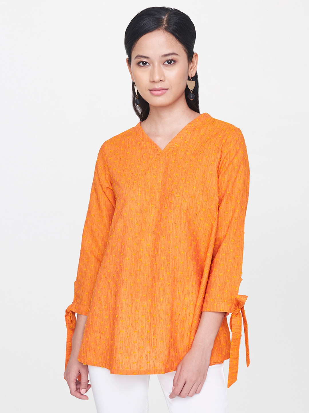 

Global Desi Women Mustard Yellow Self Design Longline Pure Cotton Top