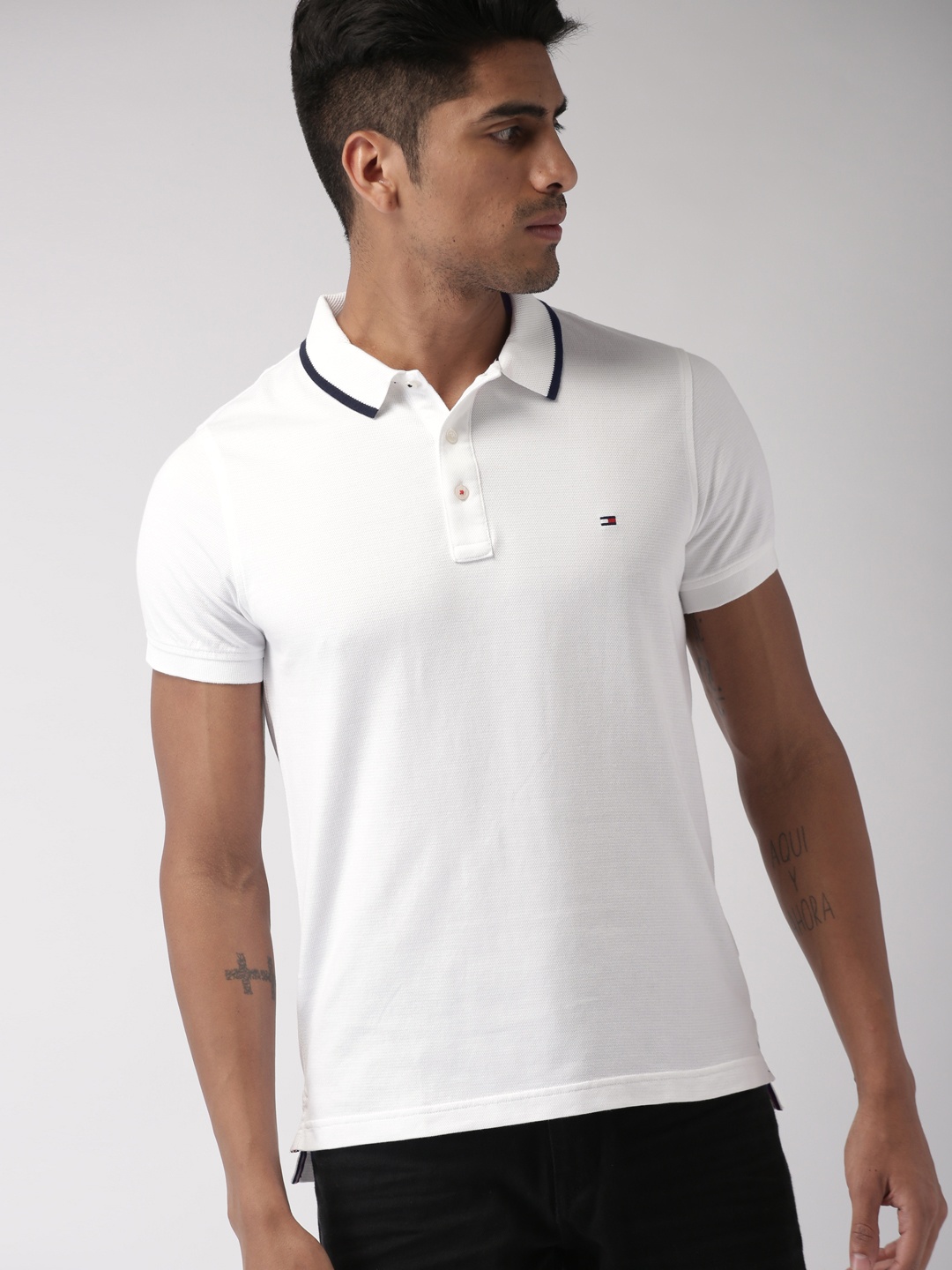 

Tommy Hilfiger Men White Solid Slim Fit Polo Collar Pure Cotton T-shirt