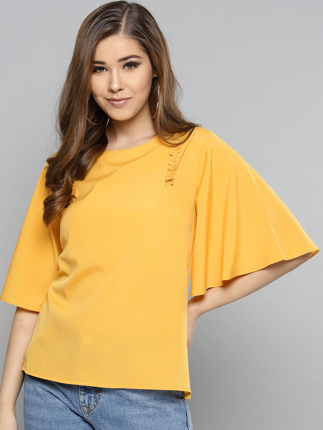 

RARE Women Yellow Solid Top