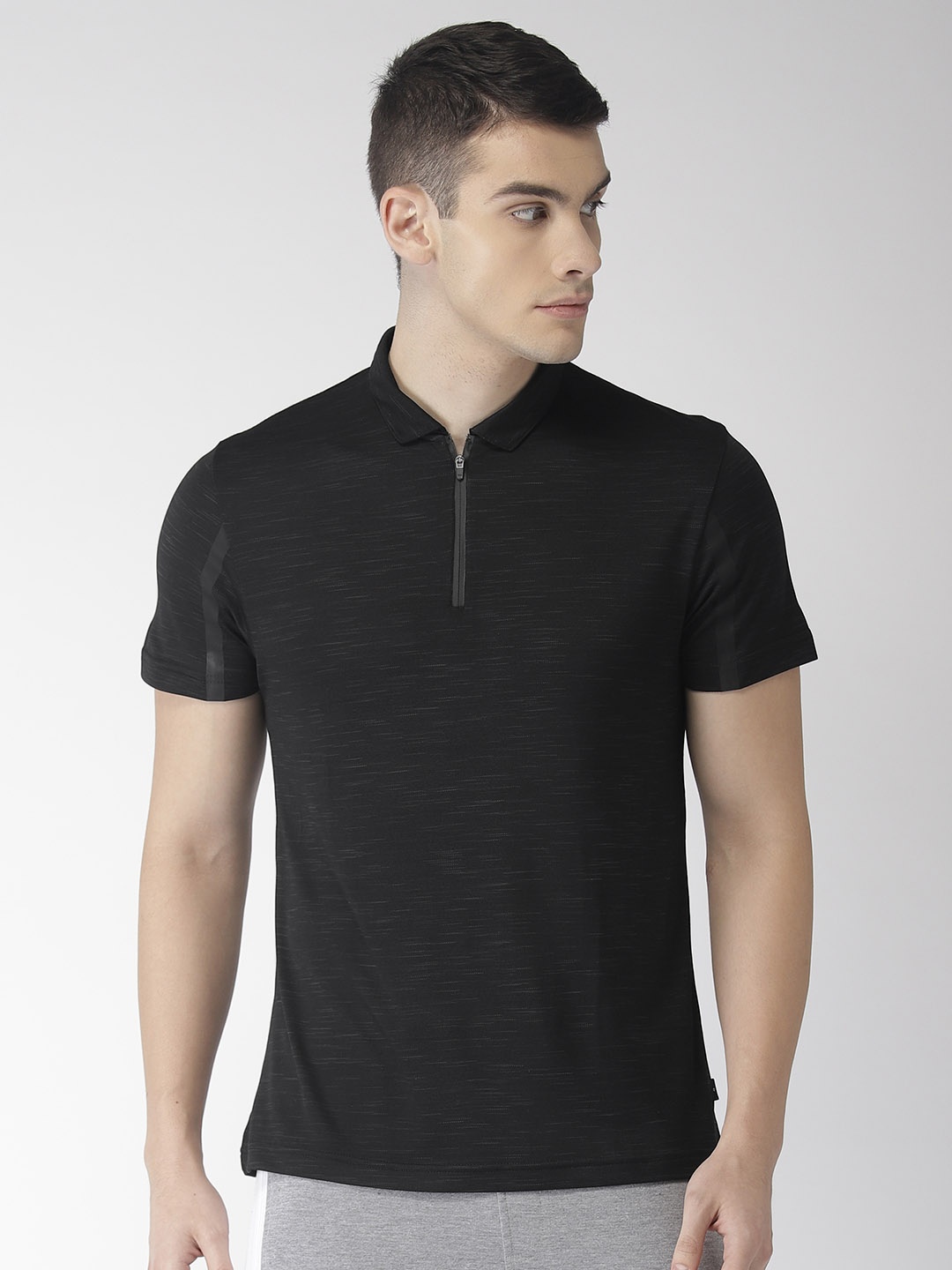 

Flying Machine Men Black Solid Polo Collar T-shirt