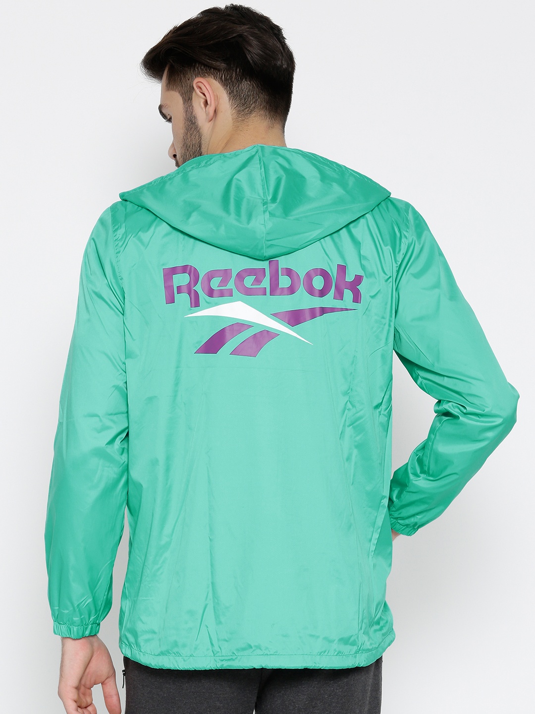 

Reebok Classic Men Green Solid Regular Fit Jacket