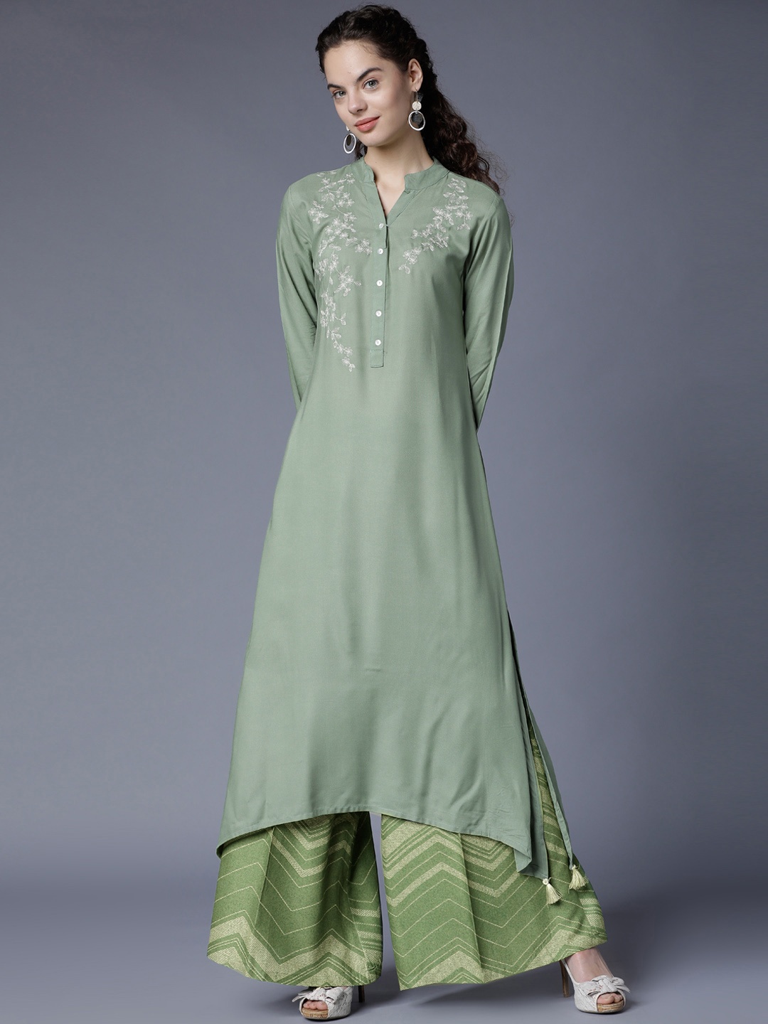 

Vishudh Women Green Embroidered Kurta with Palazzos