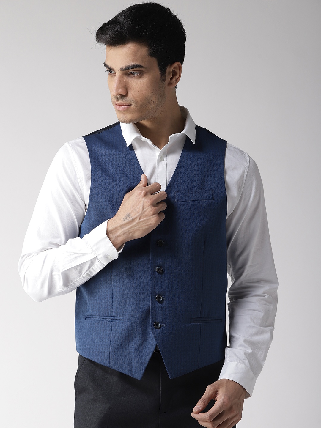 

Arrow Men Navy Blue Woven Design Waistcoat