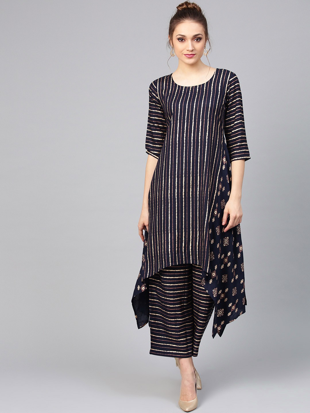 

Libas Women Navy Blue & Golden Striped Kurta with Palazzos