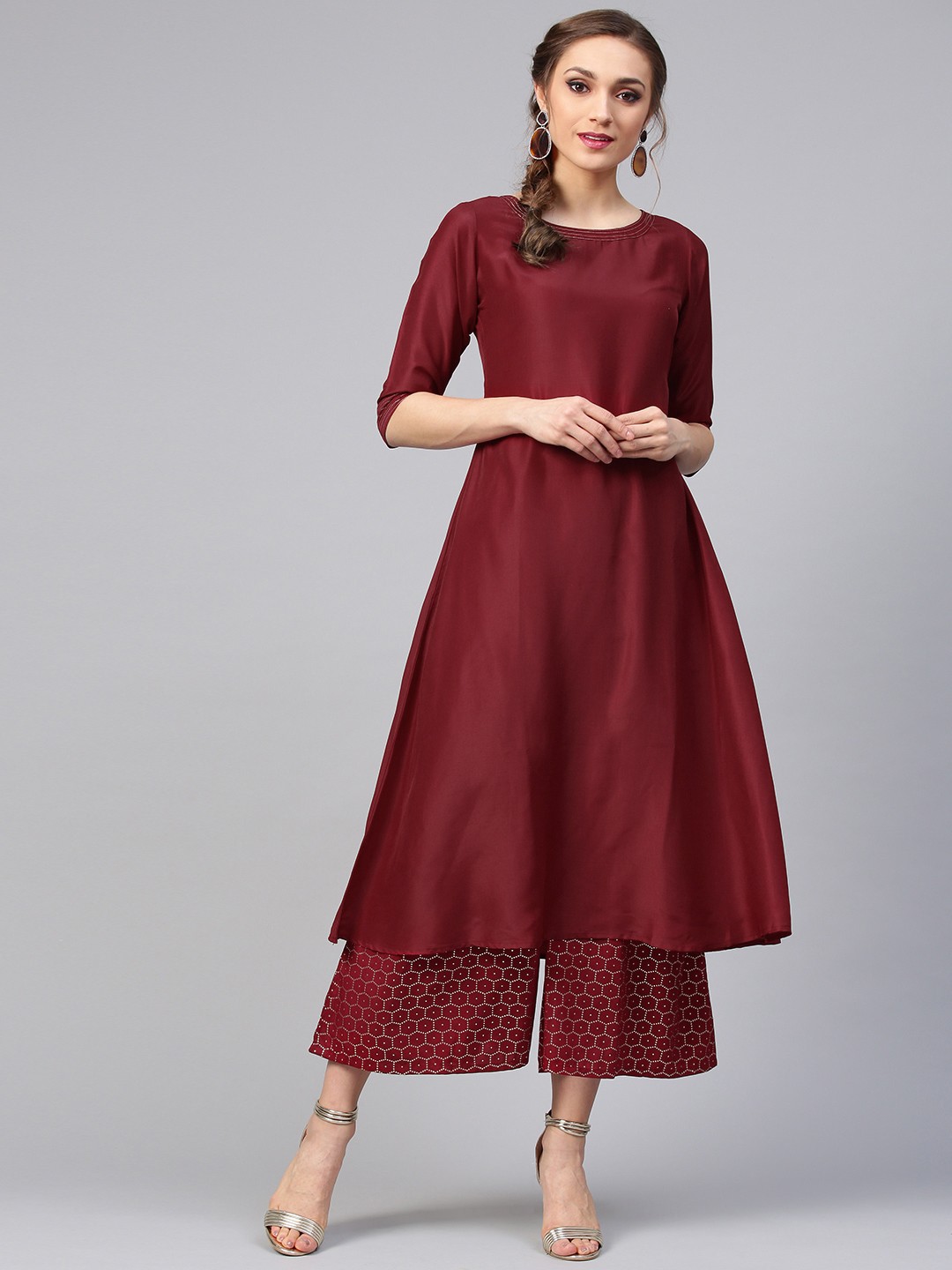 

Libas Women Maroon & Golden Solid Kurta with Palazzos
