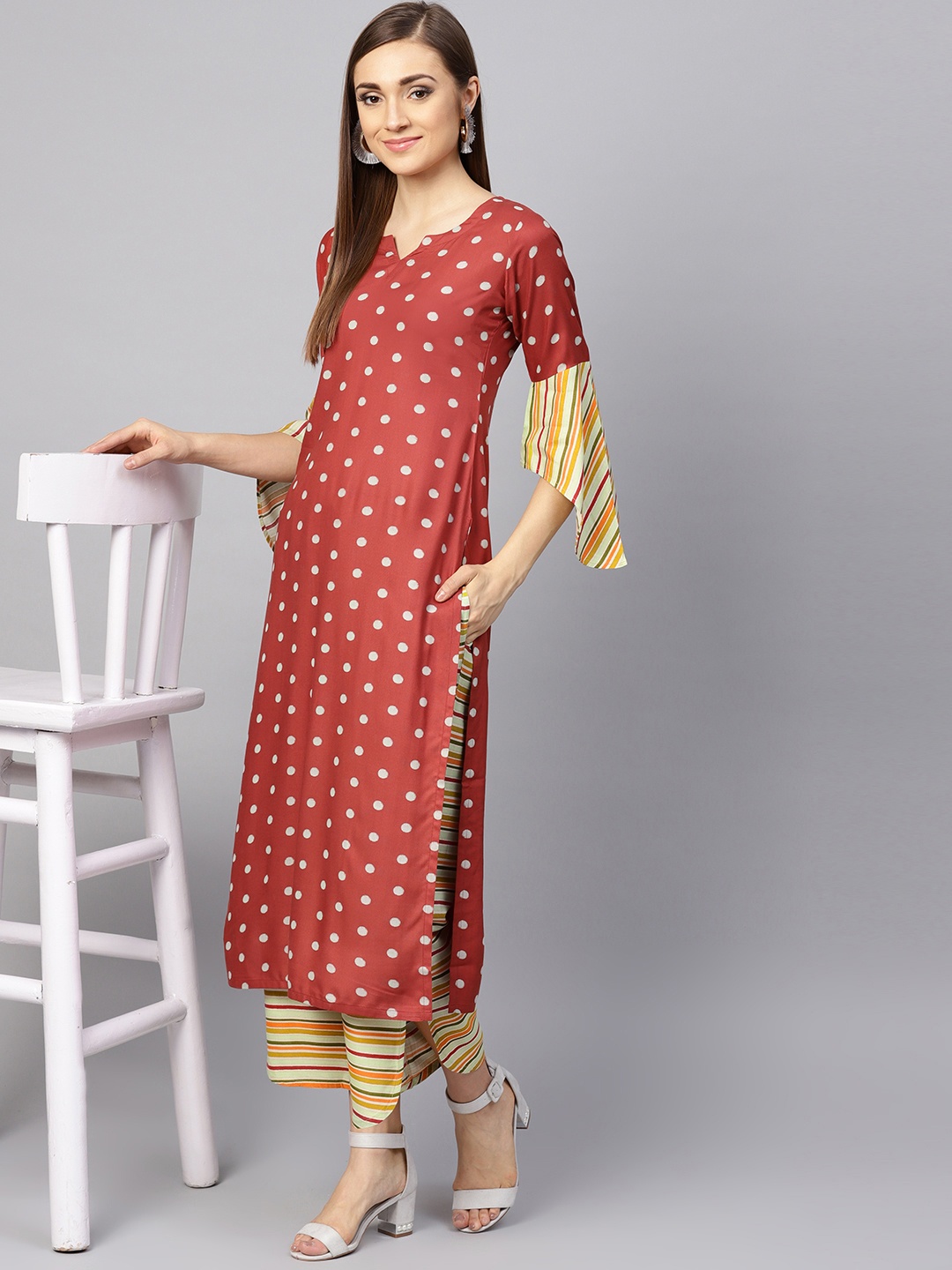 

Libas Women Rust Red & Green Printed Kurta with Palazzos