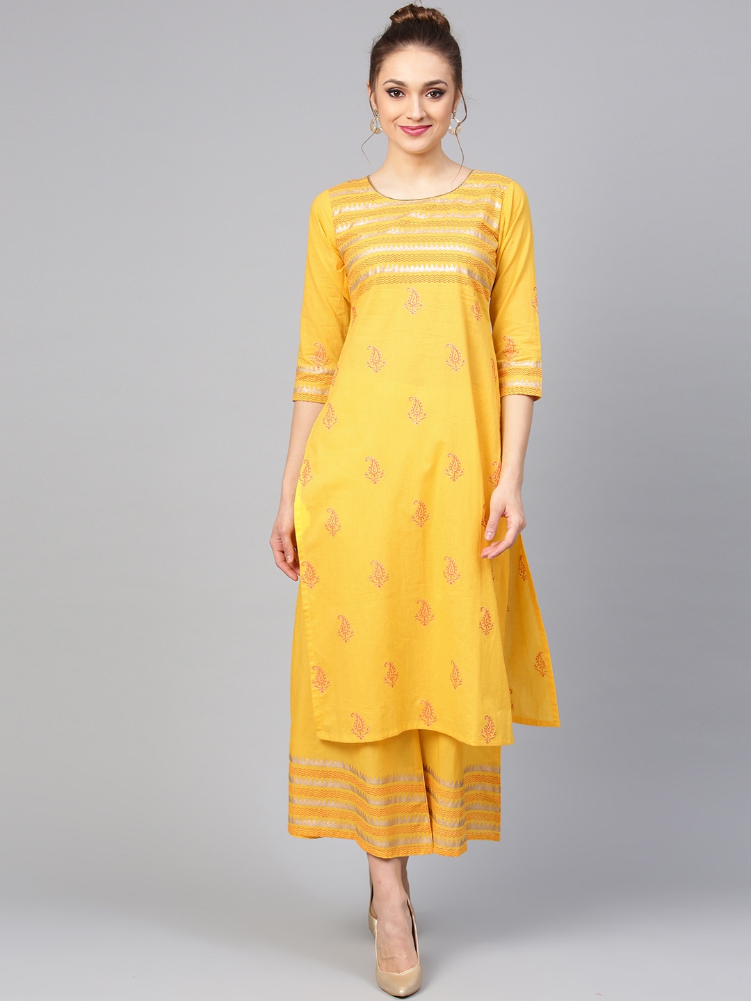 

Libas Women Yellow Block Print Kurta with Palazzos