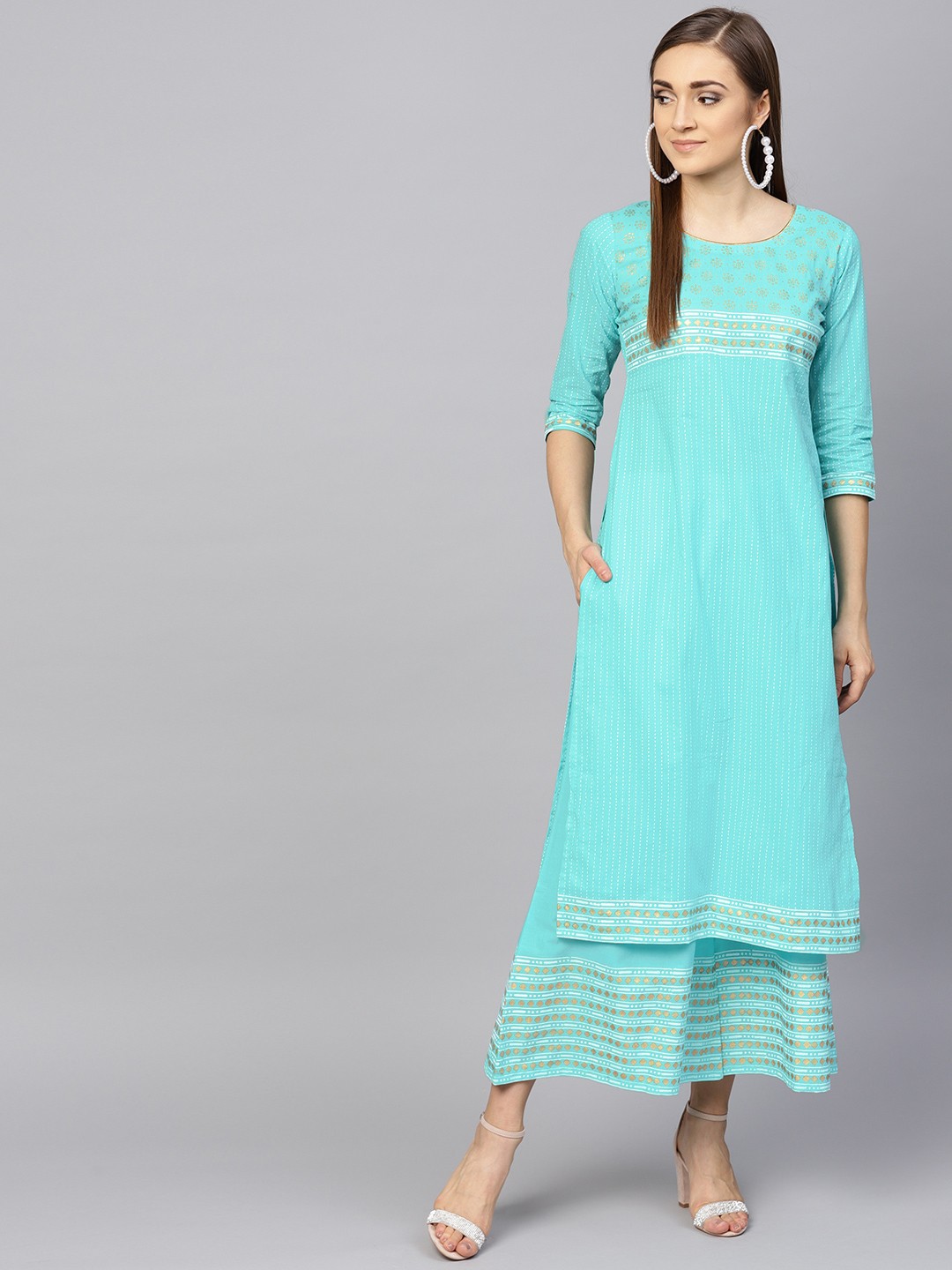

Libas Women Turquoise Blue Striped Kurta with Palazzos