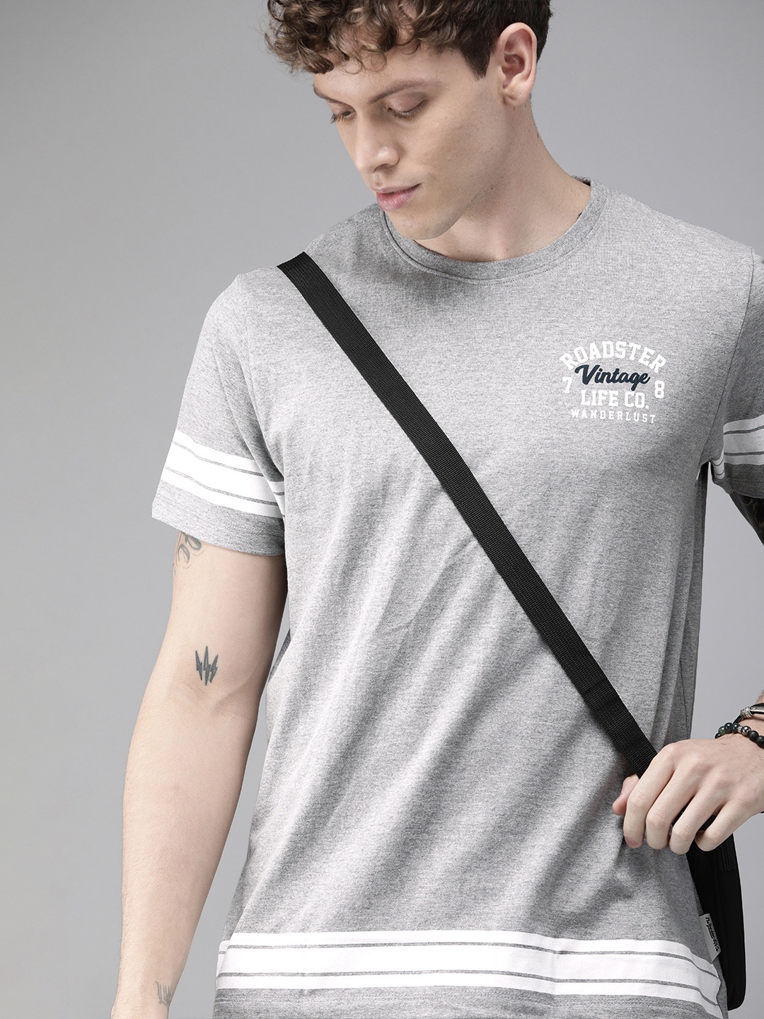 

The Roadster Lifestyle Co Men Grey Melange & White Striped Round Neck T-shirt with Printed Detailing