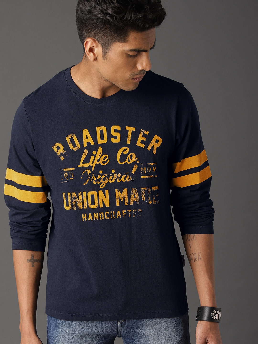

The Roadster Lifestyle Co Men Navy Blue Varsity Graphic Pure Cotton T-shirt