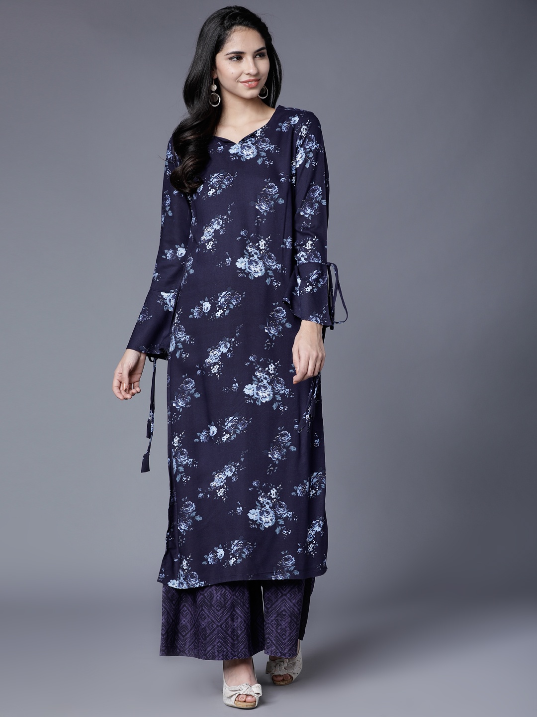 

Vishudh Women Navy Blue Printed Kurta with Palazzos