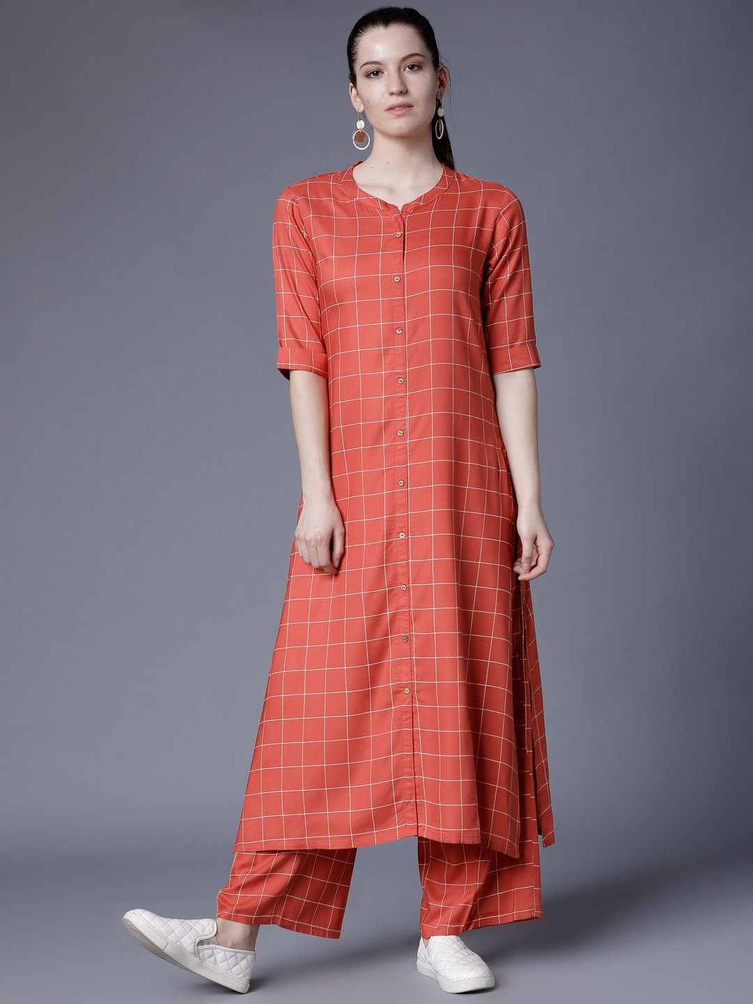 

Vishudh Women Rust Printed Kurta with Palazzos
