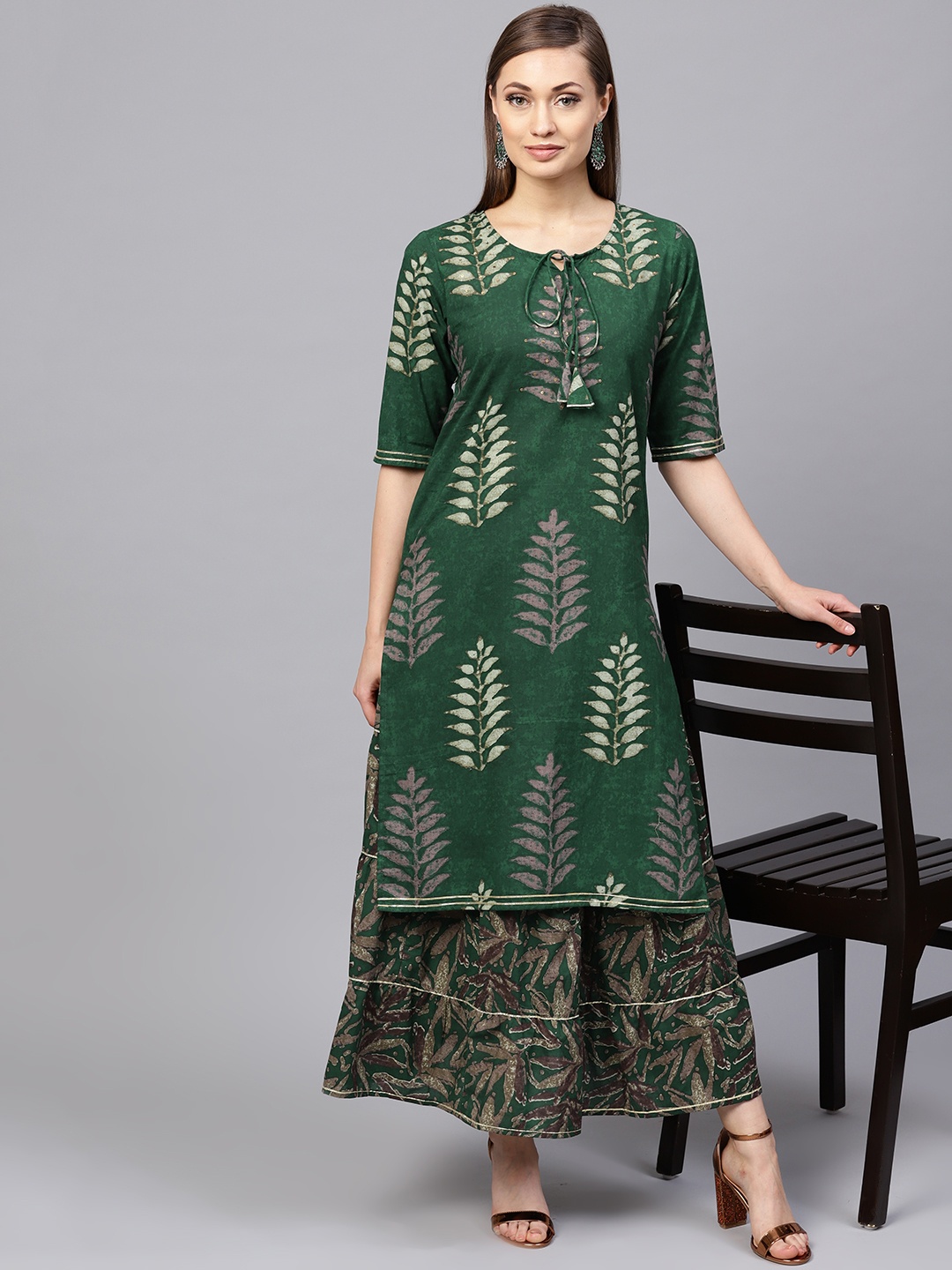 

Yuris Women Green Printed Handloom Kurta with Skirt