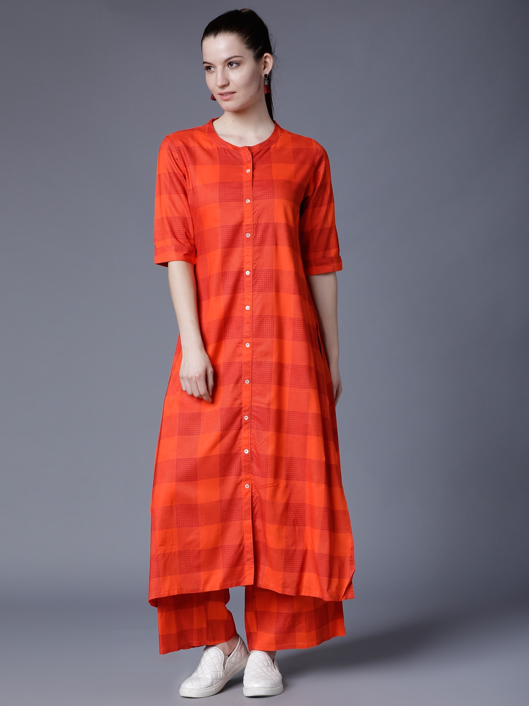 

Vishudh Women Orange Printed Kurta with Palazzos
