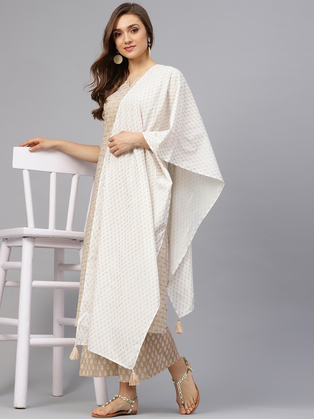 

Idalia Women Beige & White Printed Kurta with Palazzos & Dupatta