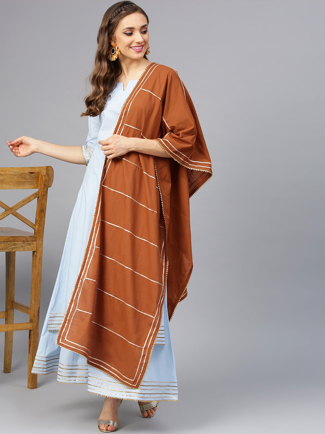 

Idalia Women Blue Solid Kurta with Palazzos & Dupatta